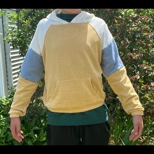 Blue, yellow, and cream sweatshirt